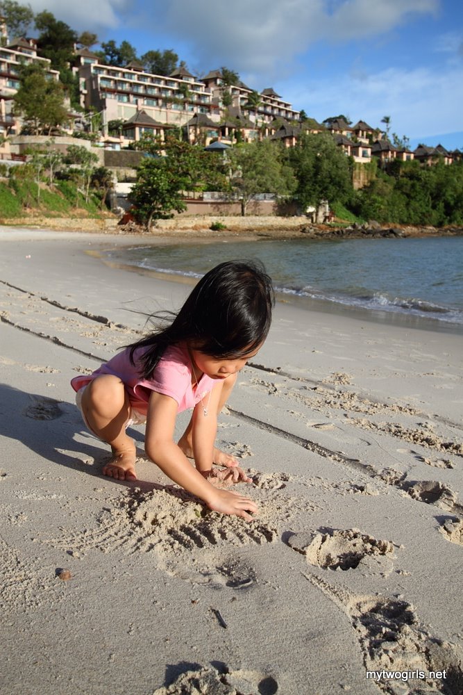 Zaria playing sand